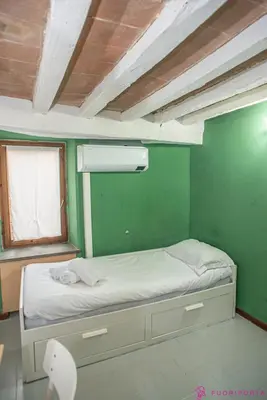 Letto o letti in una camera di FuoriPorta Affitti Brevi - Monolocale Emanuele 5
