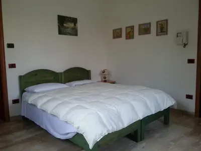 Letto o letti in una camera di RESIDENCE LA VECCHIA REGGIO