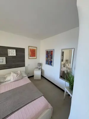 Letto o letti in una camera di Affittacamere PZ