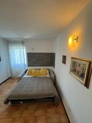 Letto o letti in una camera di Affittacamere PZ