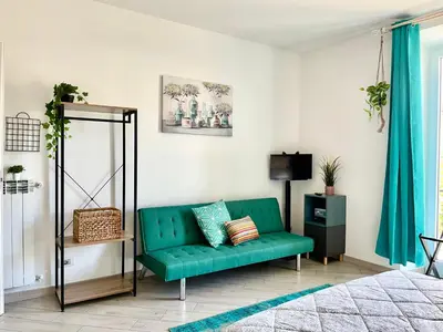 Letto o letti in una camera di La Monstera Rooms