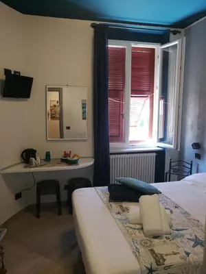 Letto o letti in una camera di La Rosa Dei Venti