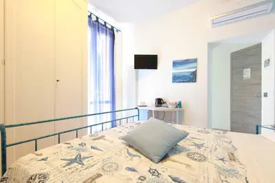 Letto o letti in una camera di La Rosa Dei Venti