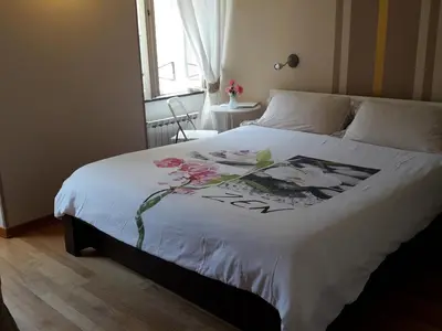 Letto o letti in una camera di La Luna nel Borgo