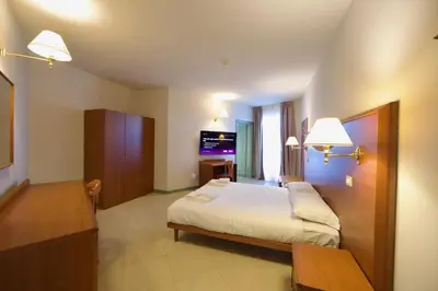 Letto o letti in una camera di HC Hotel Touring Seniga