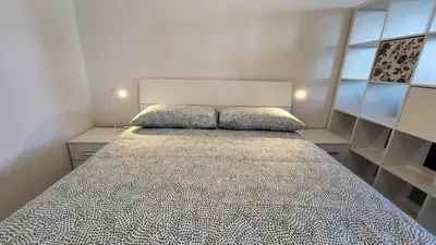Letto o letti in una camera di Alloggio sul parco