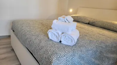 Letto o letti in una camera di Alloggio sul parco