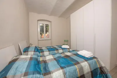 Letto o letti in una camera di 237 - Casa Colombo Riva Vista Mare a 10metri Spiaggia