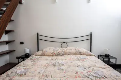 Letto o letti in una camera di 236 - Casa Corso Colombo - Centro Storico, Mare e spiaggia a 200m - PARCHEGGIO GRATIS INCLUSO