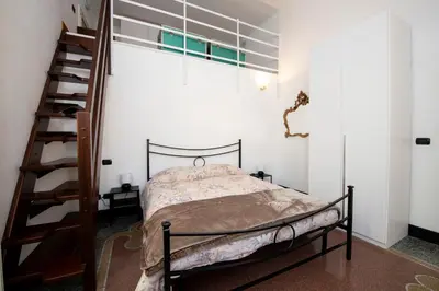 Letto o letti in una camera di 236 - Casa Corso Colombo - Centro Storico, Mare e spiaggia a 200m - PARCHEGGIO GRATIS INCLUSO