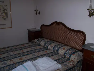 Letto o letti in una camera di B&B Portobello