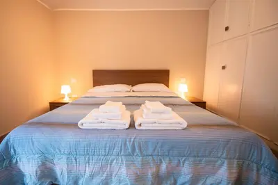 Letto o letti in una camera di Porta Galileo l Comfort Rooms & Parking