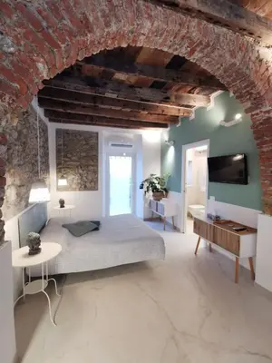Letto o letti in una camera di Mirto e Lavanda