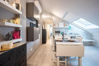 Cucina o angolo cottura di GuestHost - Parma Elegant and Sweet Apartments