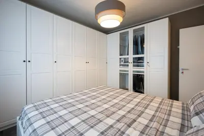 Letto o letti in una camera di GuestHost - Parma Elegant and Sweet Apartments