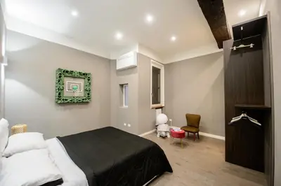 Letto o letti in una camera di ACADEMY TORTELLINOSUITE Modena