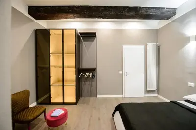 Letto o letti in una camera di ACADEMY TORTELLINOSUITE Modena
