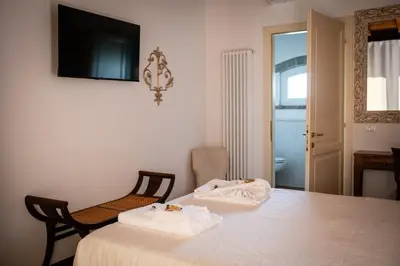 Letto o letti in una camera di Agriturismo Corte Capiluppia