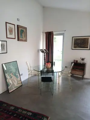 Area soggiorno di Suite per gli ospiti