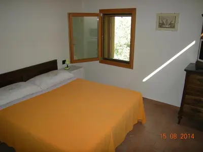 Letto o letti in una camera di Castello San Romano