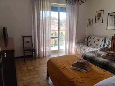 Letto o letti in una camera di Appartamento con posto auto privato comodo a centro e spiagge
