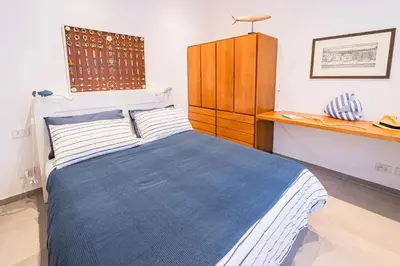 Letto o letti in una camera di La Casetta del Bistromare
