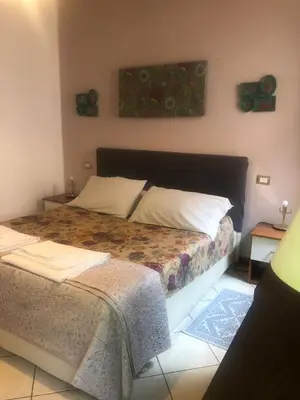Letto o letti in una camera di Bed & Breakfast Monti 85