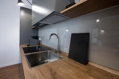 Cucina o angolo cottura di 223 - Ma & Ma Luxury Apartment 1 grande - 500metri da mare e spiaggia, vicino alla Baia del Silenzio - PARCHEGGIO GRATIS PRIVATO INCLUSO