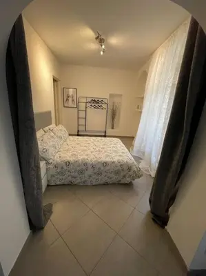 Letto o letti in una camera di Cuore di Parma