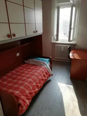Letto o letti in una camera di Delizioso trilocale Lodi città