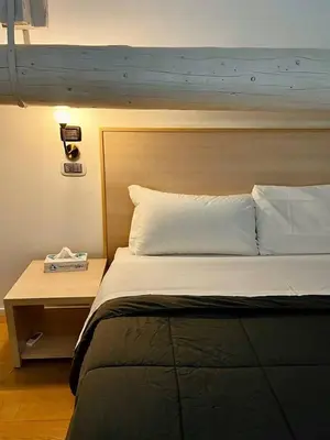 Letto o letti in una camera di Residenza Frattini