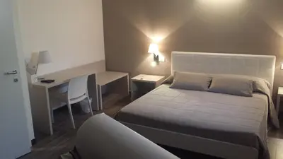 Letto o letti in una camera di Sabbia d'Oro locanda & beach