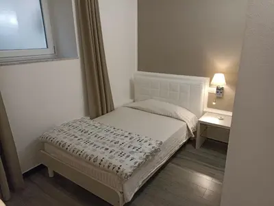 Letto o letti in una camera di Sabbia d'Oro locanda & beach