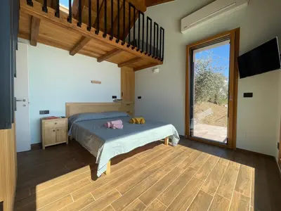 Letto o letti in una camera di Villa Nina
