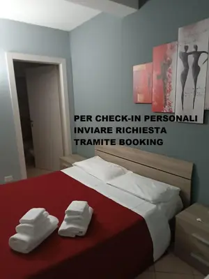 Letto o letti in una camera di HOTEL DED 1 CHECKIN a RICHIESTA