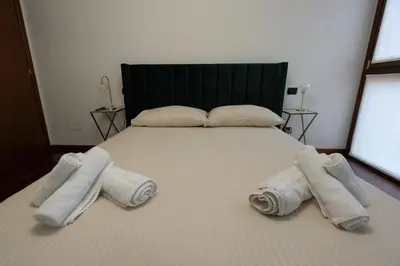 Letto o letti in una camera di Appartamento Il Crocevia