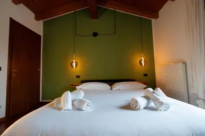Letto o letti in una camera di Appartamento Il Crocevia