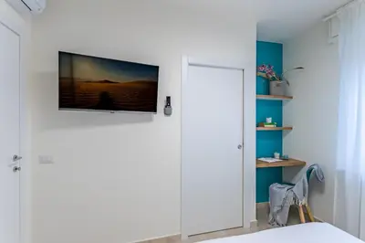 TV o dispositivi per l'intrattenimento presso Altea Home - Pavia City - by Host4U