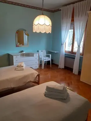 Letto o letti in una camera di Gold House