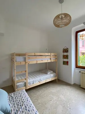 Letto o letti in una camera di Casina Levanto, levanto