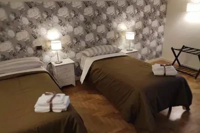 Letto o letti in una camera di B&b La casa di Cesy