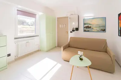Area soggiorno di 307 - Casa Sara, 5 minuti di auto dal Mare e dal centro di Sestri, con PARCHEGGIO PRIVATO