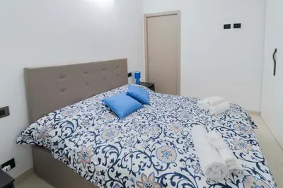 Letto o letti in una camera di 307 - Casa Sara, 5 minuti di auto dal Mare e dal centro di Sestri, con PARCHEGGIO PRIVATO