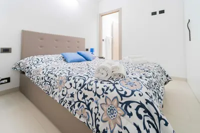Letto o letti in una camera di 307 - Casa Sara, 5 minuti di auto dal Mare e dal centro di Sestri, con PARCHEGGIO PRIVATO