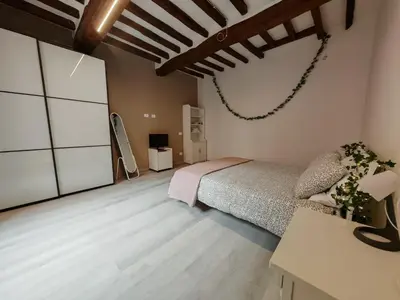 Letto o letti in una camera di La Sosta-appartamento a pochi passi dalla stazione
