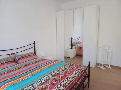 Letto o letti in una camera di Sunny House