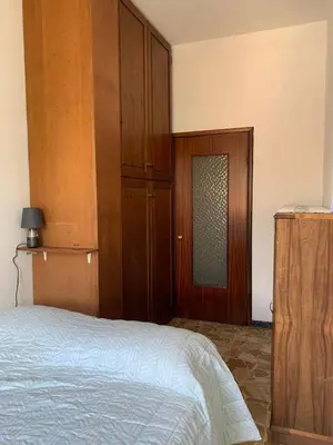 Letto o letti in una camera di Casa Martina