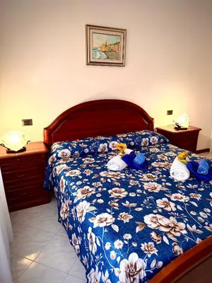 Letto o letti in una camera di Casa di Francesca