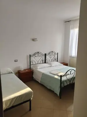 Letto o letti in una camera di Il Portichetto