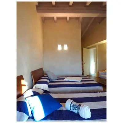 Letto o letti in una camera di Appartamento Matilde